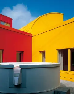 Michael Wilford, vivid colours, colour in architecture, external wall insulation, bright colours, luminous render, coloured facades, coloured render, through-tinted colours, bright colours, deep red, deep blue, vivid yellow, inspirational facades