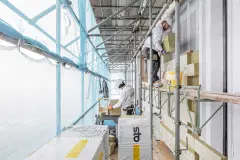 Construction of the “De Puls” residential tower: timber frame construction with EWIS and resin brick slips from Sto