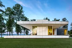 Glass creates an elegant, easy to clean facade on a residential showcase, in Virginia, USA