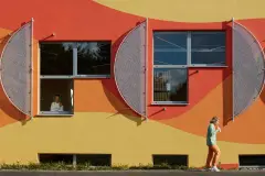 vivid colours, SIr Peter Cook, bright orange, deep red, luminous yellow, coloured render, coloured facade, coloured stucco, coloured plaster, colour in architecture, bright colours