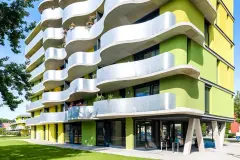 coloured render, coloured facade, coloured insulated facade, bright, vivid, luminous colours, bright yellow, radiant green