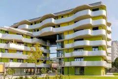 coloured render, coloured facade, coloured insulated facade, bright, vivid, luminous colours, bright yellow, radiant green