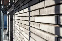 New centre Porz project, close-up of building 1 with StoBrick brick slips on EWIS