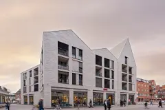 Residential and commercial building New centre Porz, insulated brick facade by Sto