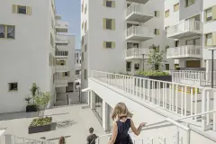Exterior view of the Rivus Vivere urban neighbourhood, white brick facades with StoBrick
