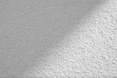 StoSilent Decor M - Spray applied, stippled silicate based acoustic plaster finish available in a range of pastel shades.