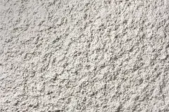 StoSilent Miral AP - Spray applied, coarse, mineral based acoustic plaster system.